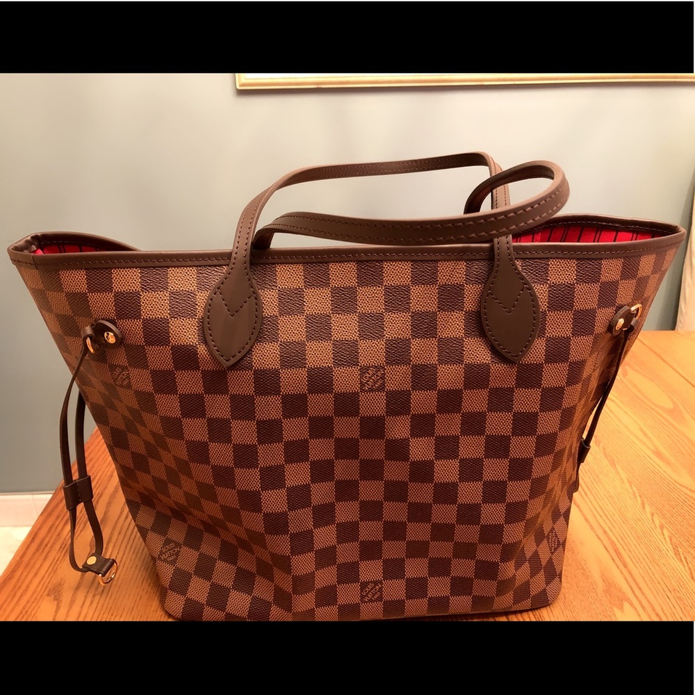 BRAND NEW** NEVERFULL MM. NEVER USED